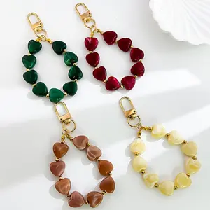 A Stylish Acrylic Resin Heart DIY Phone Chain And Phone Case Accessory, Perfect As a Small Christmas Gift Or Keychain for Bags.