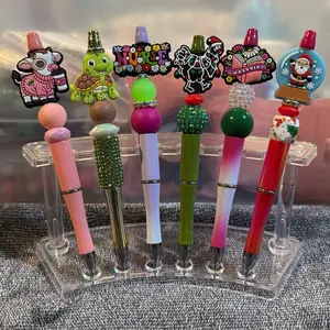 Live Pen Sale Featuring Adorable Character Toppers and Focal Pen with Vibrant Bead Accents Perfect for Gift Giving and Fun Writing