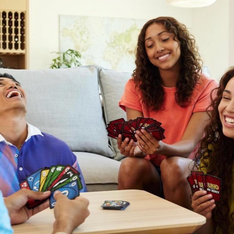 Mattel Games UNO Show ‘em No Mercy Card Game in Storage & Travel Tin for Kids, Adults & Family Night with Extra Cards, Special Rules & Tougher Penalties uno show card games card game