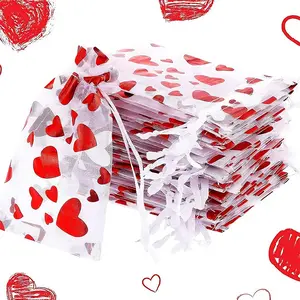 Valentine's Day candy gauze bags, red heart-shaped candy bags, jewelry storage bags, Valentine's Day drawstring gift bags, party return gift bags, suitable for weddings, festival parties and other occasions. Perfect Valentine's Day gift bags (100-piece se