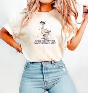 Hold On Partner I’m Overstimulated Comfort Colors Shirt – Cowboy Duck & Frog Meme Tee – Funny Western Graphic – Unisex Cotton T-Shirt – Full Size Fit