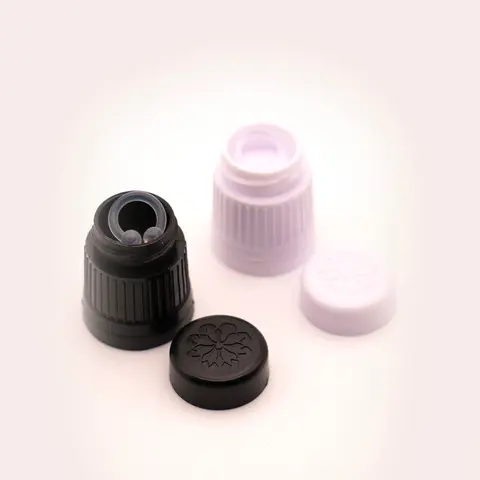 Essence Essential Oil Bottle Top with Built-In Soaking Bay Organiser Canister