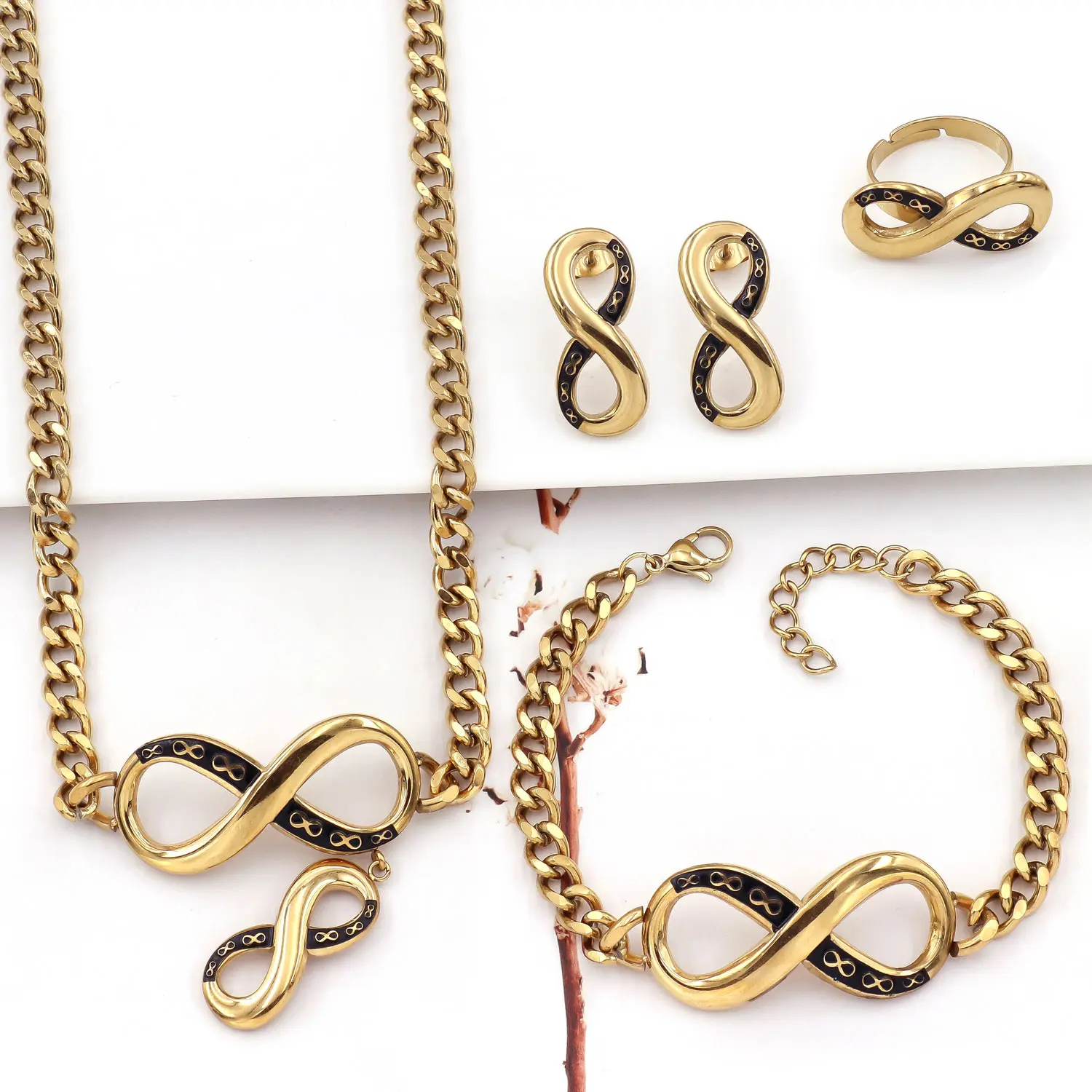 Unisex 4-Piece Infinity Cuban Chain Costume Jewelry Set - Cuban Bracelet Jewelry Sets, Fade-Resistant Bright Gold Tone with Black Accents, Waterproof Stainless Steel Necklace, Stud Earrings, Adjustable Open Ring for Casual Daily Elegance Wear