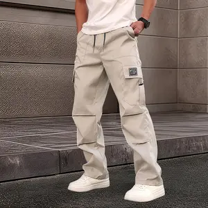 Men’s casual solid-color athletic pants — casual cargo pants with multiple flap pockets, a drawstring waist, polyester fabric, outdoor work pants, running pants with pockets — 100% polyester, non-stretch solid color, regular fit suitable for all seasons.