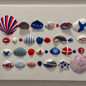 America Shell Artwork - Collection of Colorful Decorative Shells with Various Patterns and Designs