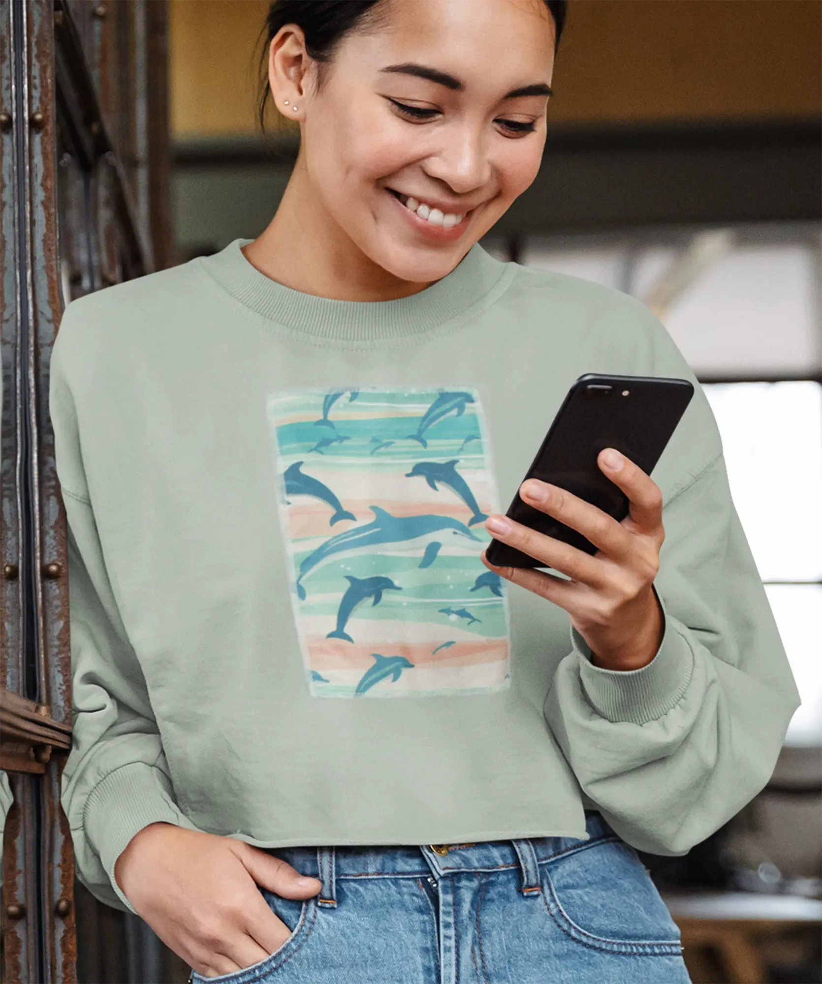 Sage Cropped Fleece Sweatshirt with Dolphin Graphic Patch Detail and Raw Hem | Super Soft Drop Shoulder Pullover, Casual, Women's Sage Cropped Sweatshirt, Swimming Dolphin, Relaxed Drop, Crew Neck, Mini Crop