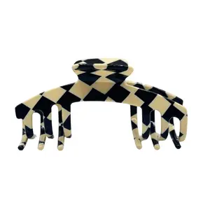 The Kacee Checkered Black and White Hair Clip with a Bold, Retro Vibe for a Vibrant Look Designed for Adjustable Hats