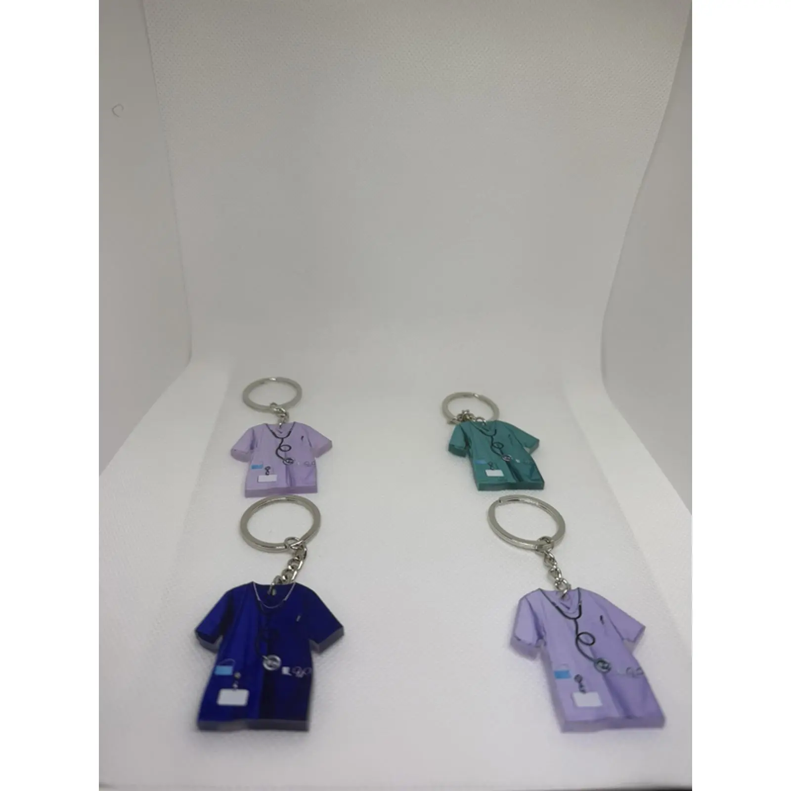 Nursing Keychains - Purple, Teal, and Blue Scrubs Design with Stethoscope and ID Badge