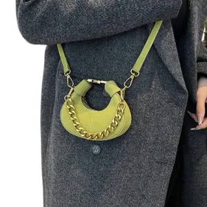 Small Bag with Green Color and Gold Chain Detailing - Product Title