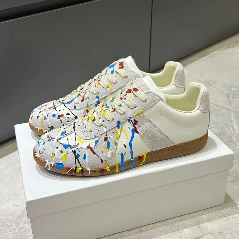 White Leather Low Top Sneakers Multicolor Paint Splatter Detailing Gum Rubber Sole Lace Up Casual Trainers for Street Wear Daily Walking Weekend Outings Campus Trips
