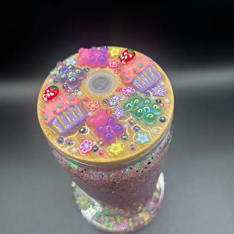 Custom Snowglobe Tumbler with Custom Lid Featuring Colorful Cupcake Design and Sparkly Glitter Finish
