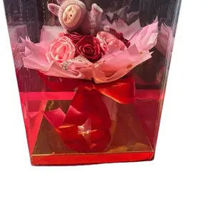 Mini Ramito de Flores Eternas with Pink Roses and Red Accents in Elegant Red Container