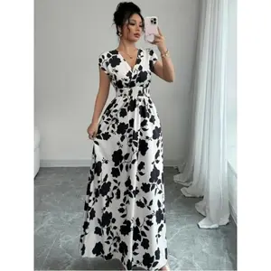 Elegant women’s summer dress with a V-neckline, A-line silhouette, batwing sleeves, floral print featuring leaves; casual fashion, perfect for daily wear and special occasions. GARMENTARY