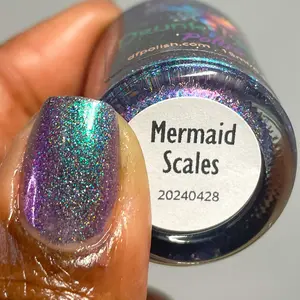 Mermaid Scales | A Darkened Violet Nail Polish with Scattered Holo and Shimmering from Emerald Green to Blue to Purple