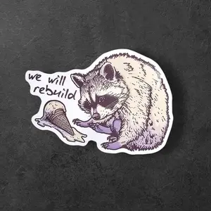 We Will Rebuild Raccoon Vinyl Sticker: Funny Animal Art Decal