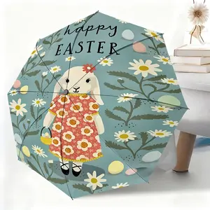 The rabbit-themed waterproof folding umbrella, featuring a floral dress, a colorful basket, and daisies and Easter eggs, is suitable for both men and women and is portable for travel and everyday use.