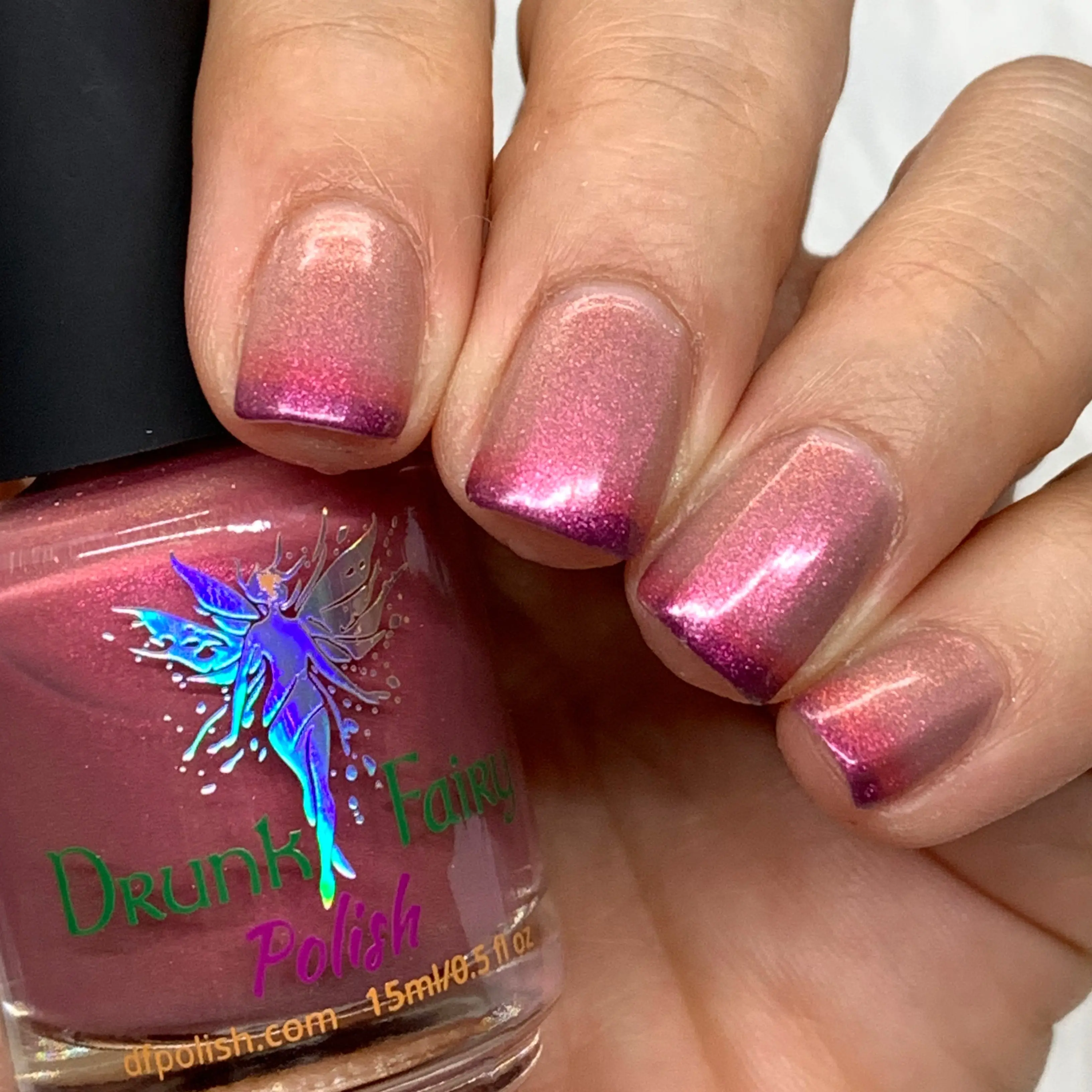 Tilted | Tri-Thermal Nail Polish that Goes from Dark Cranberry when Cold, to Berry, to Taupe When Warm