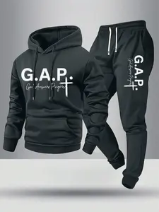 Spring/autumn lightweight men’s two-piece set featuring a hooded sweatshirt with an “Answered Prayer” lettering print and matching sweatpants with a cross pattern pocket design; street-style athletic elastic-waist drawstring pants set suitable for cool we