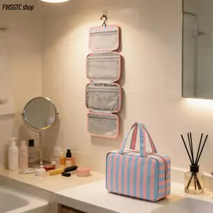 Large Capacity Hanging Travel Cosmetic Bag, foldable and waterproof with multi-compartment design and convenient hanging hook. Suitable for men and women, ideal for travel, gym use and daily makeup storage.