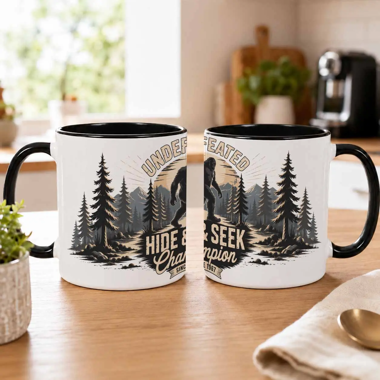 Bigfoot Undefeated Hide and Seek Champion Mug (11oz/15oz)  Retro Forest Mountain Design  Durable Ceramic Funny Coffee Cup  Perfect for Camping Adventures  Office Humor  Birthday Gift  Outdoor Enthusiasts  Travel and Home Use