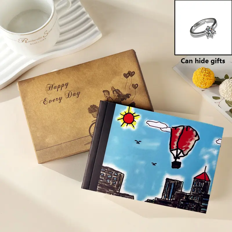(Ring not included) Comic Book Ring Box—A unique, creative engagement ring box with a hidden compartment for the gift. Perfect for engagements, anniversaries, Valentine's Day, birthdays, Christmas, or other special occasions—Balloon design.