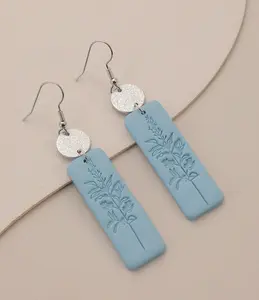 Embossed Soft Clay Light Blue Earring with Floral Design and Silver Accent