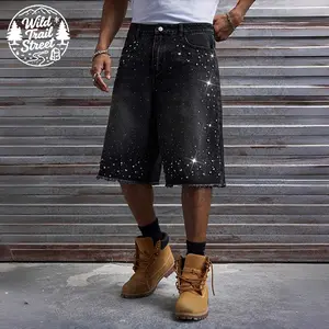 Men’s loose-fit denim shorts with an all-over rhinestone star design, relaxed silhouette, suitable for streetwear and summer wear.