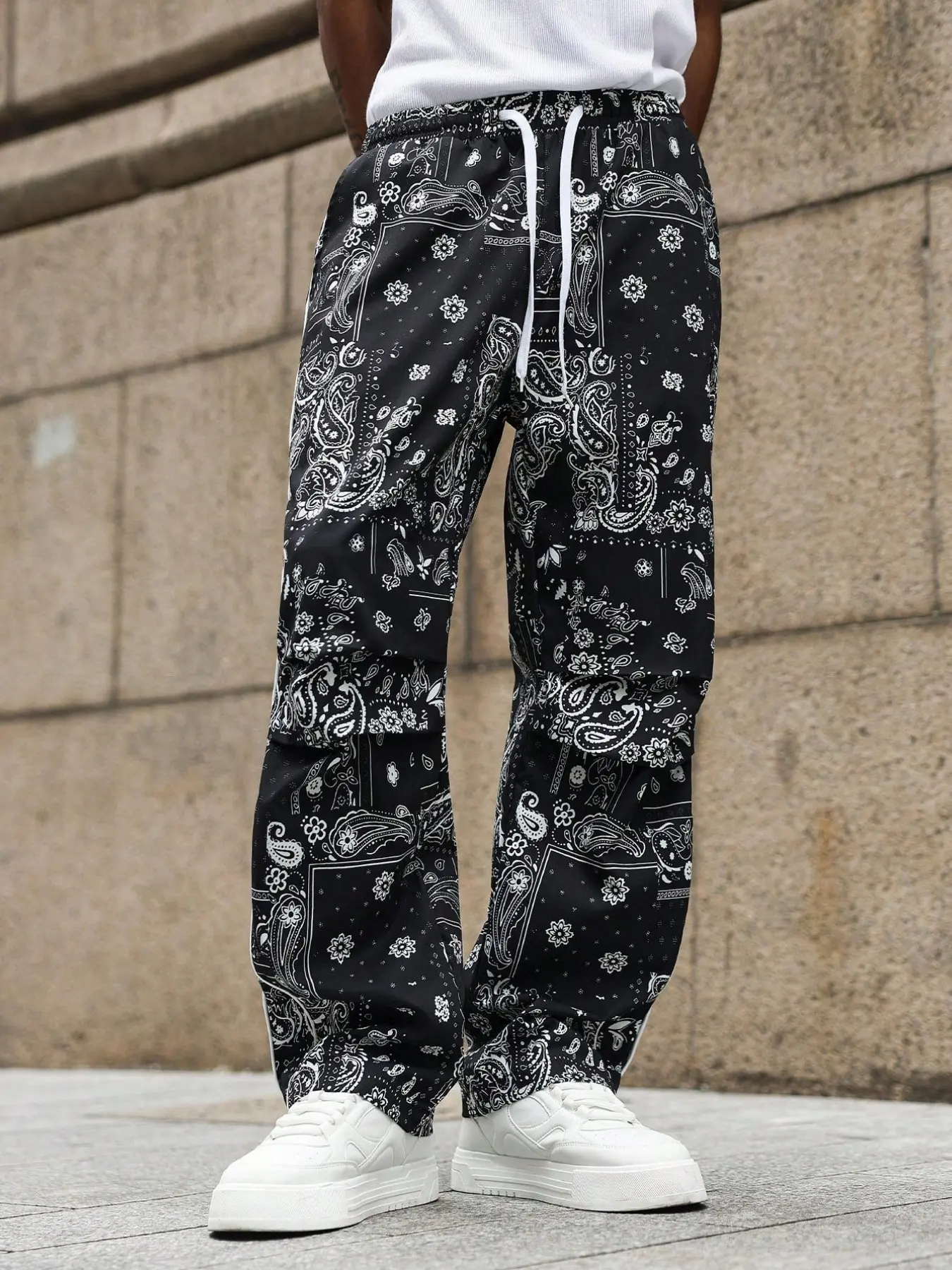 One-piece men's cargo pants with retro paisley print on red background, street-style cool and tough look, Casual, multi-pocket design, Casual Fit Drawstrings, Casual Comfy Trouser, Casual Straight Leg