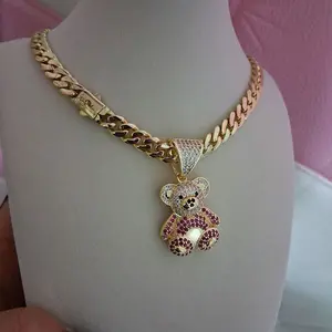 Gold plated chain ,8millimeters thick 16  inches long with bear pendant.