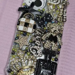 iPhone 15 customize, black, and gold bling jacket case.