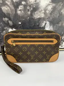 Pre-owned canvas Clutches & Wristlets Dragonne Clutch GM