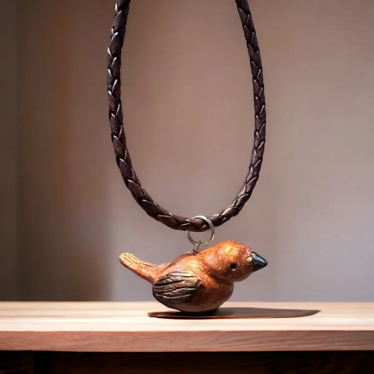 Adorable polymer clay bird pendant on a leather cord. Perfect companion when you need a friend but without responsibility and effort