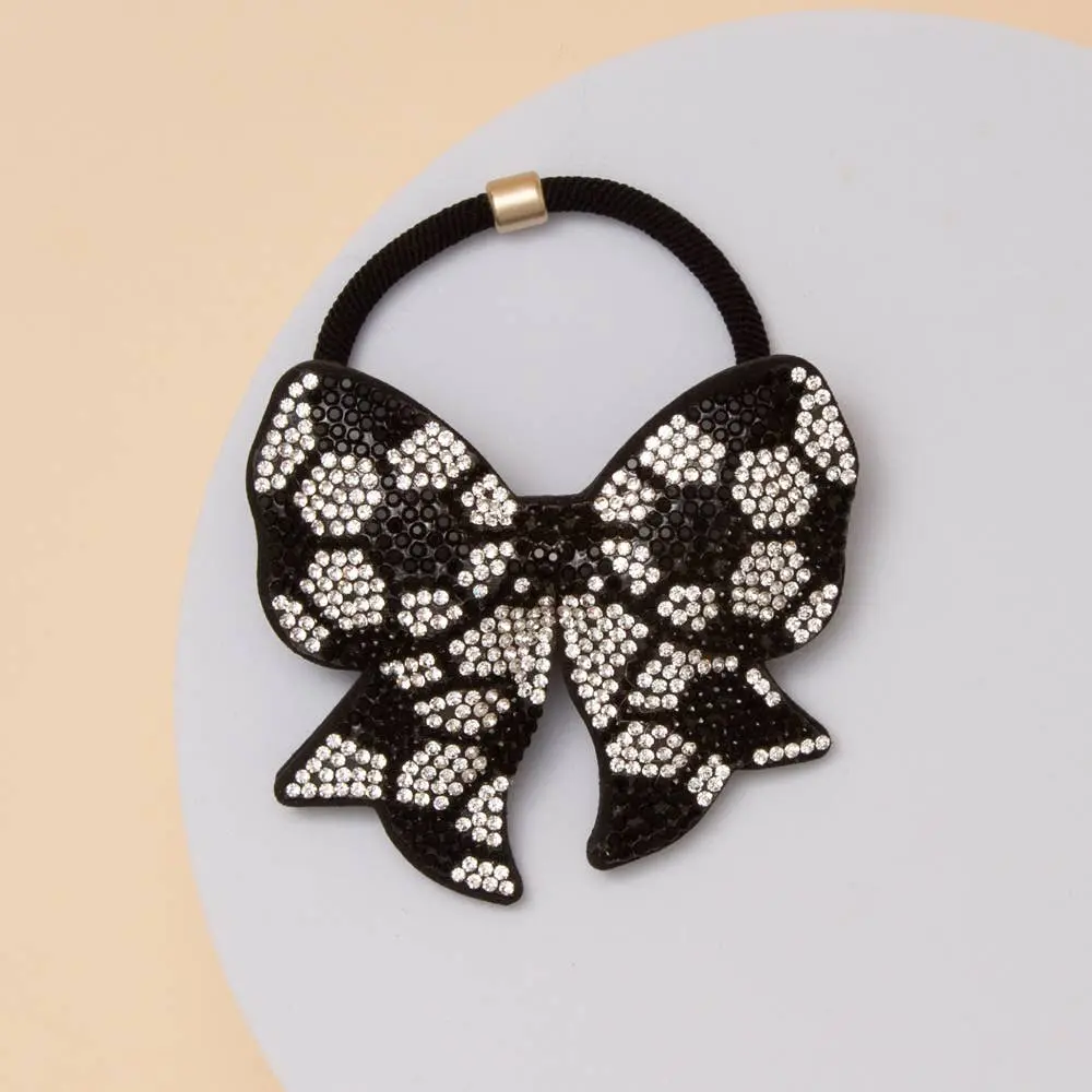 Bling on the Field - Stylish Bow Hair Tie with Sparkling Rhinestone Patterns for Soccer Players