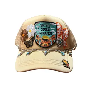 Trucker Hat with Embroidered Patch and Chain Detail Featuring Wide Open Spaces Design and Floral Accents
