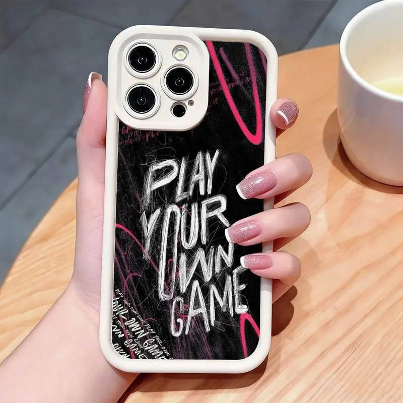 Inspirational slogan "PLAY YOUR OWN GAME" pattern phone case. Compatible with iPhone 17 Pro Max/16 Pro Max/15 Plus/14/13/12/11, TPU soft case. Compatible with Galaxy S26 Ultra/S25 Plus/S24/S23, Dopamine color. Compatible with Galaxy A54/A53/A33/A15.
