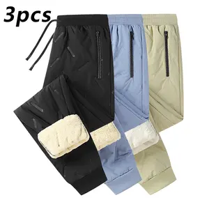 Men's fleece-lined casual pants set of three, featuring a versatile casual style, warm fleece lining, zippered pockets for secure storage, and ankle cuffs with gathers for a neat windproof finish. Suitable for autumn and winter daily wear, sports, and hom