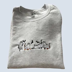 Grey and Orange Ghost Cats Playing with Bats Spooky Sweatshirt Hoodie Top Soft Cozy Customizable For Men and Women Vintage Holiday Festive Horror Ghost Pumpkin Black Cart Costume Ideas