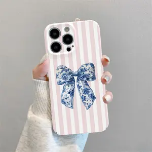 This durable, shock-absorbing, four-sided glossy phone case features a blue bow and pink and white striped pattern, and is compatible with iPhone 17, 16, 15, 14, 13, 12, and 11 models. It makes a great gift for friends or family.