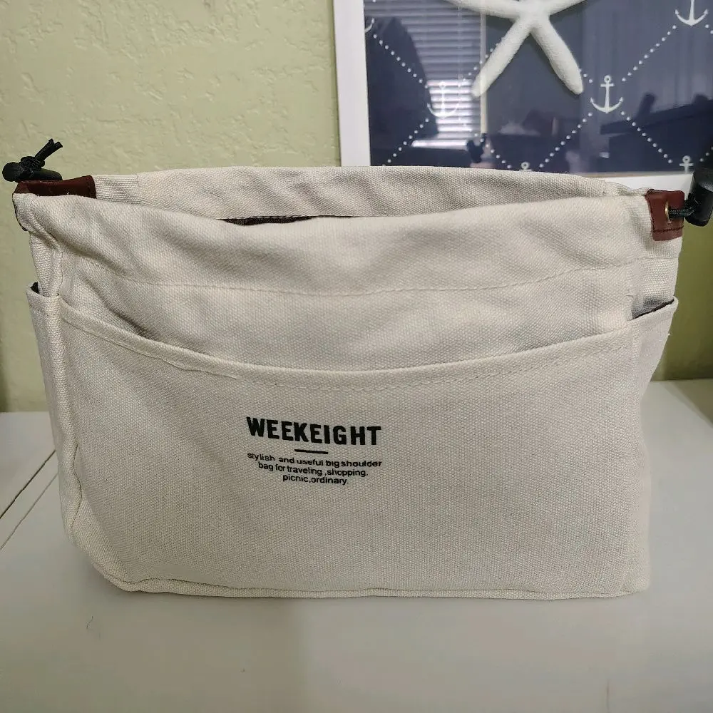 Large insert,plenty of pockets for your purse, backpack,or tote