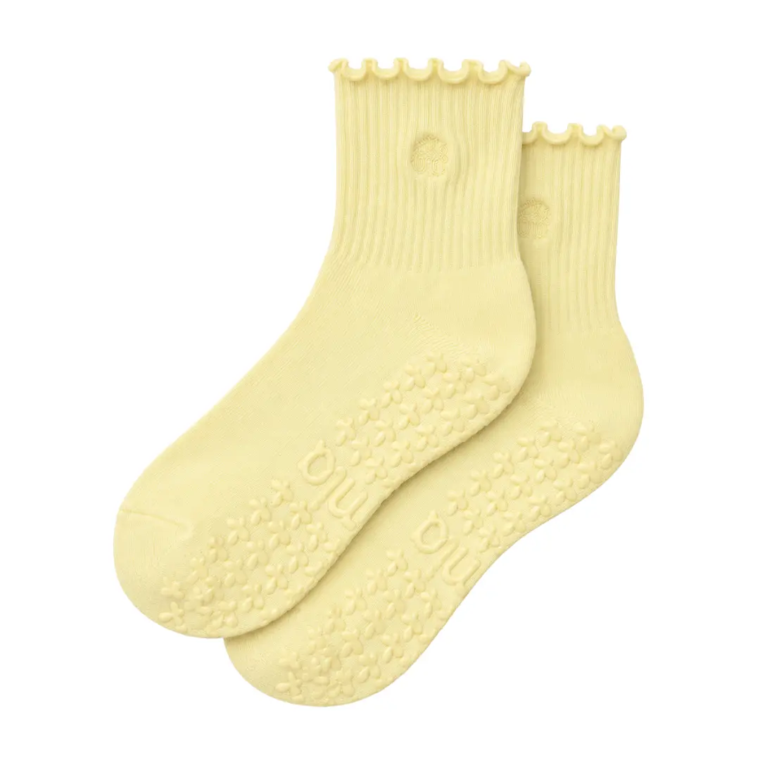 Butter Yellow Grip Sock with advanced grip technology for Pilates, Barre, Lagree, and Yoga