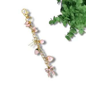 Pink Everything E-reader Chain Bookish Clip-On Accessory for Kindle Tablet or Other Device Pink Bows, Hearts, Strawberries, Butterflies and Peaches