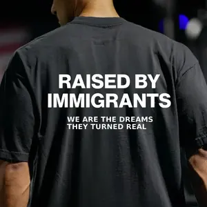 Raised By Immigrants T-Shirt, Inspirational Quote Graphic Tee for Men & Women, Unisex Streetwear Top, Motivational Message Shirt