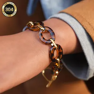 Adjustable stainless steel leopard print bracelet for women, lightweight and tarnish-resistant, bold geometric animal pattern design, modern minimalist chic style, perfect for stacking, everyday wear, gifting, or statement jewelry looks
