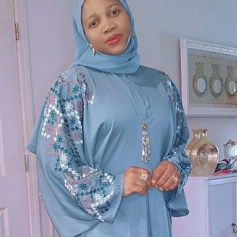 Teal Embroidered Kaftan with Floral Sleeves and Elegant Design