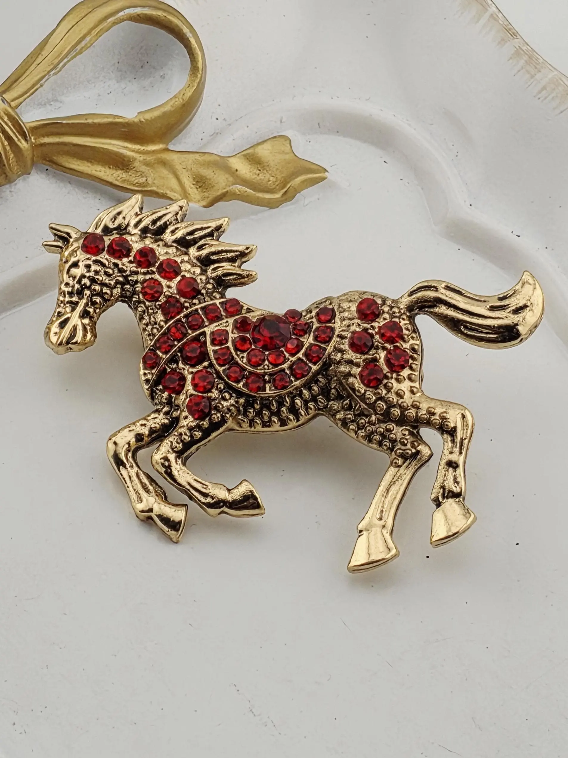 Ruby Rhinestone Horse Brooch: Gold Plated Pin with Red Gem