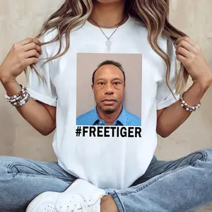 Free Tiger Mugshot Graphic T-shirt, Golf Legend Funny Meme Apparel For Men Women, Viral Trending Humor Design Novelty Gift Idea | 310326.R3035.ID00