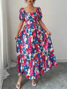 A women's long dress, Bohemian Print, with a square neckline and puff sleeves, featuring a blue base with red and pink flowers, fitted yet flowing design, perfect for cheerful and relaxed occasions, Casual wear