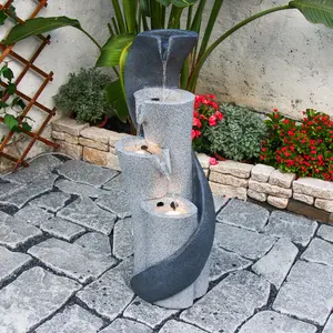 YZM Spiral column-style modern art water feature decor with built-in LED ambient lighting, ideal for indoor/outdoor courtyard and garden decoration.