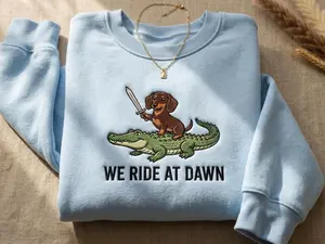We Ride At Dawn Dachshund Embroidered Sweatshirt, Funny Dachshund Warrior Crewneck, Wiener Dog Riding Crocodile Hoodie, Doxie Lover Gift