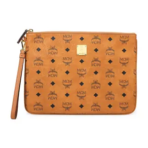 MCM Coated Canvas PVC Wristlet Clutch with Monogram Print for Women in Brown Cognac